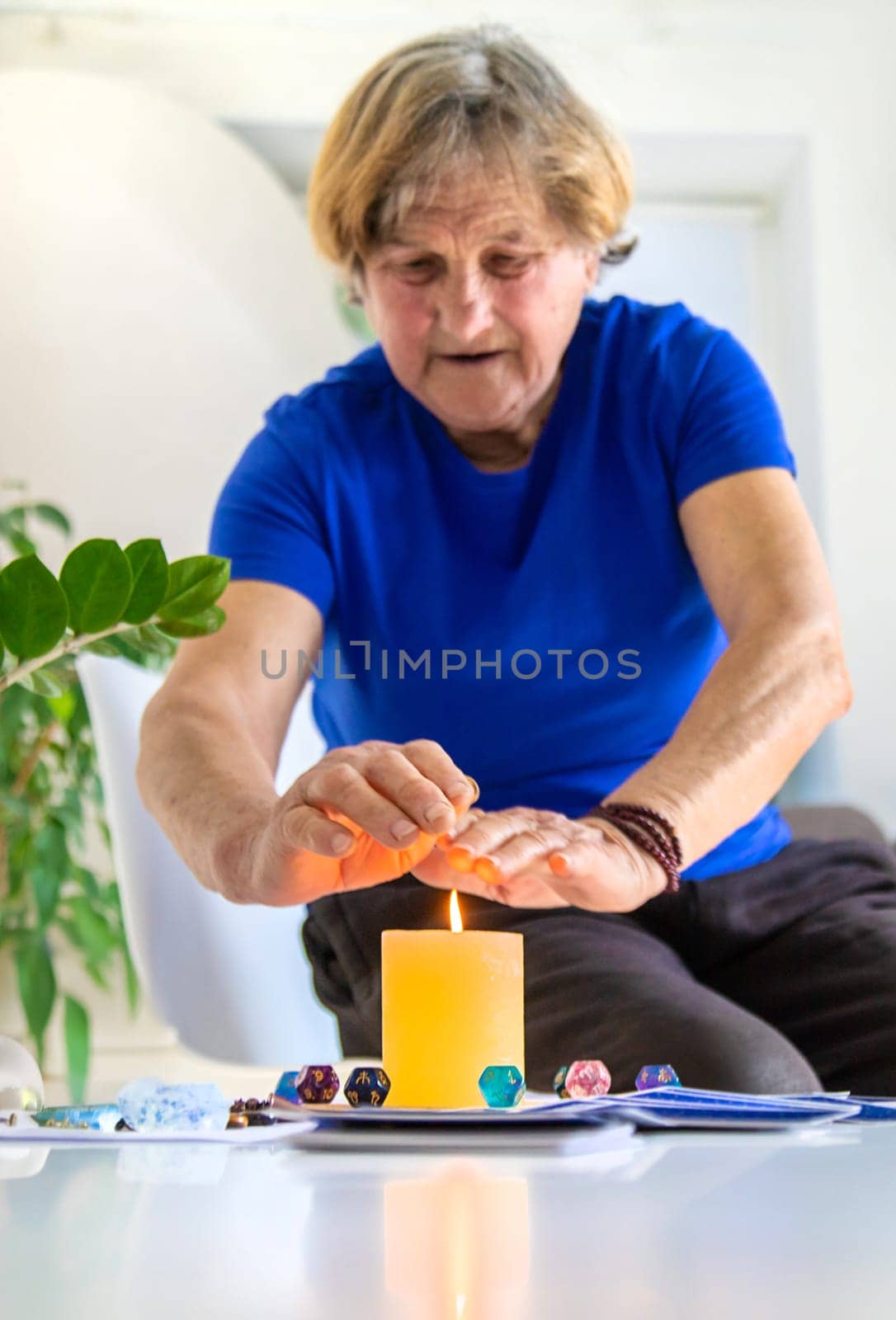 Astrology and fortune telling old fortune teller. Selective focus. people.