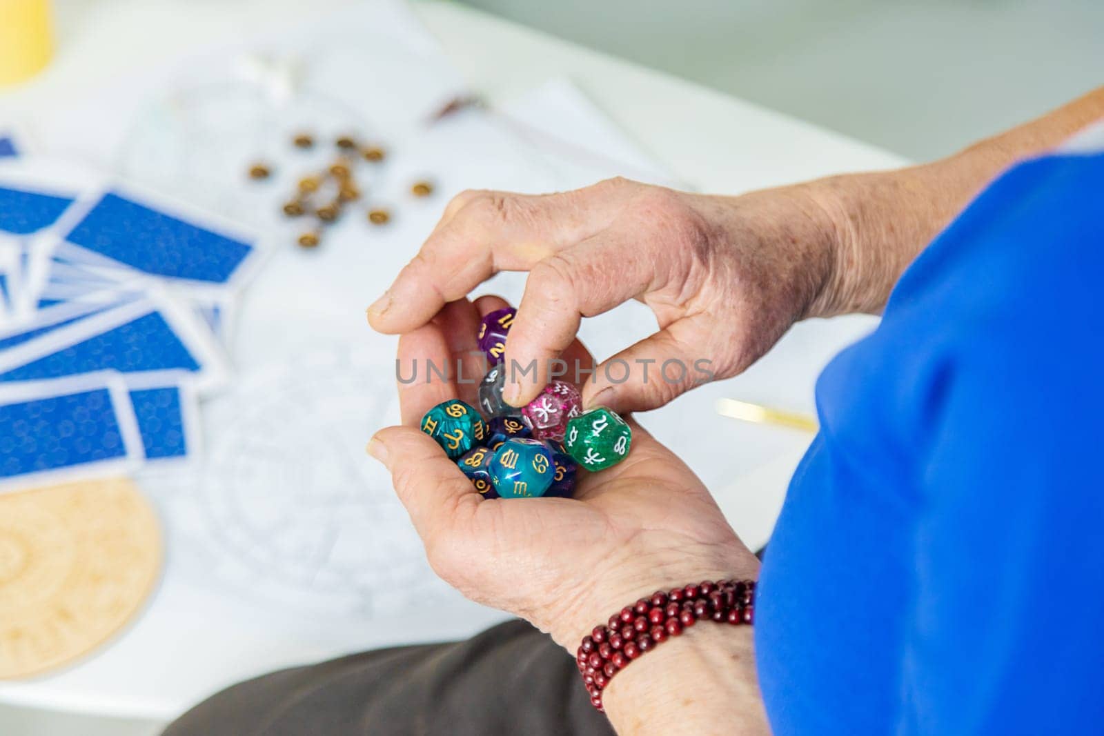 Astrology and fortune telling old fortune teller. Selective focus. people.