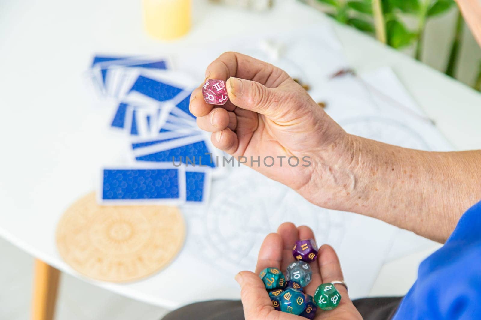 Astrology and fortune telling old fortune teller. Selective focus. people.