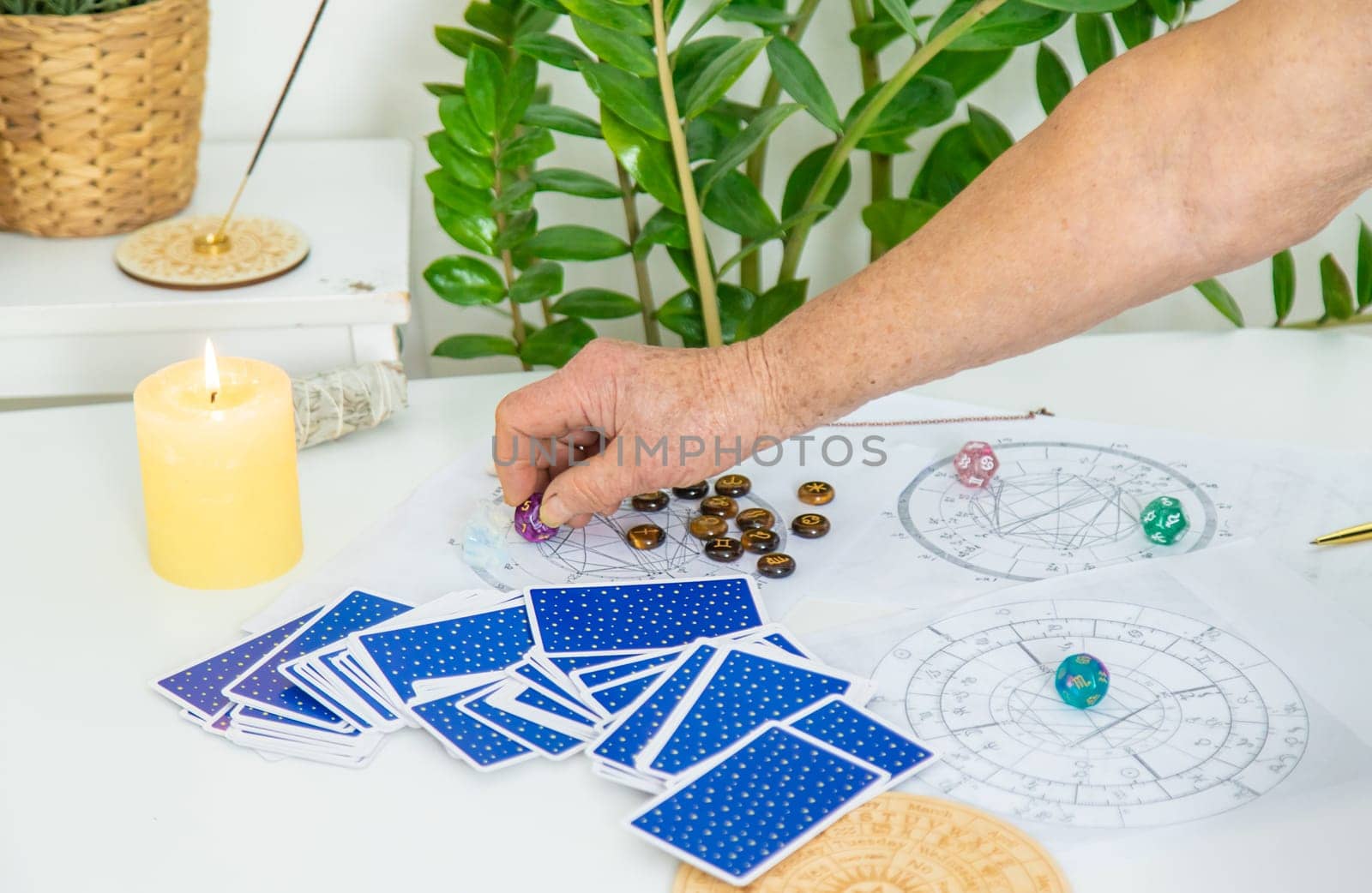 Astrology and fortune telling old fortune teller. Selective focus. people.