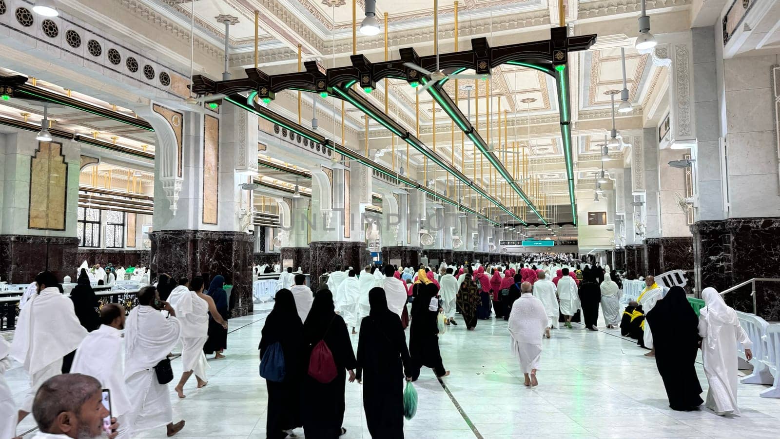 Mecca, Saudi Arabia, May 2 2024: Muslim pilgrims performing Sa'i between Safa and Marwa during Hajj and Umrah in Mecca. A sacred Islamic ritual retracing Hajar's journey, set between two hills near Masjid al-Haram.