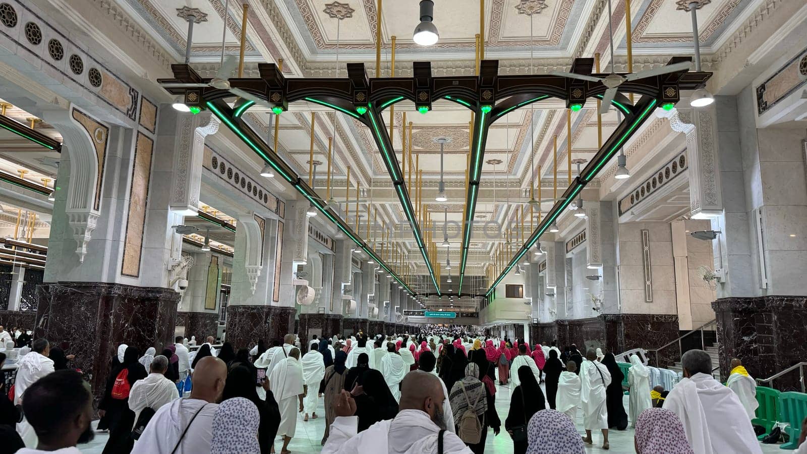 Mecca, Saudi Arabia, May 2 2024: Muslim pilgrims performing Sa'i between Safa and Marwa during Hajj and Umrah in Mecca. A sacred Islamic ritual retracing Hajar's journey, set between two hills near Masjid al-Haram.