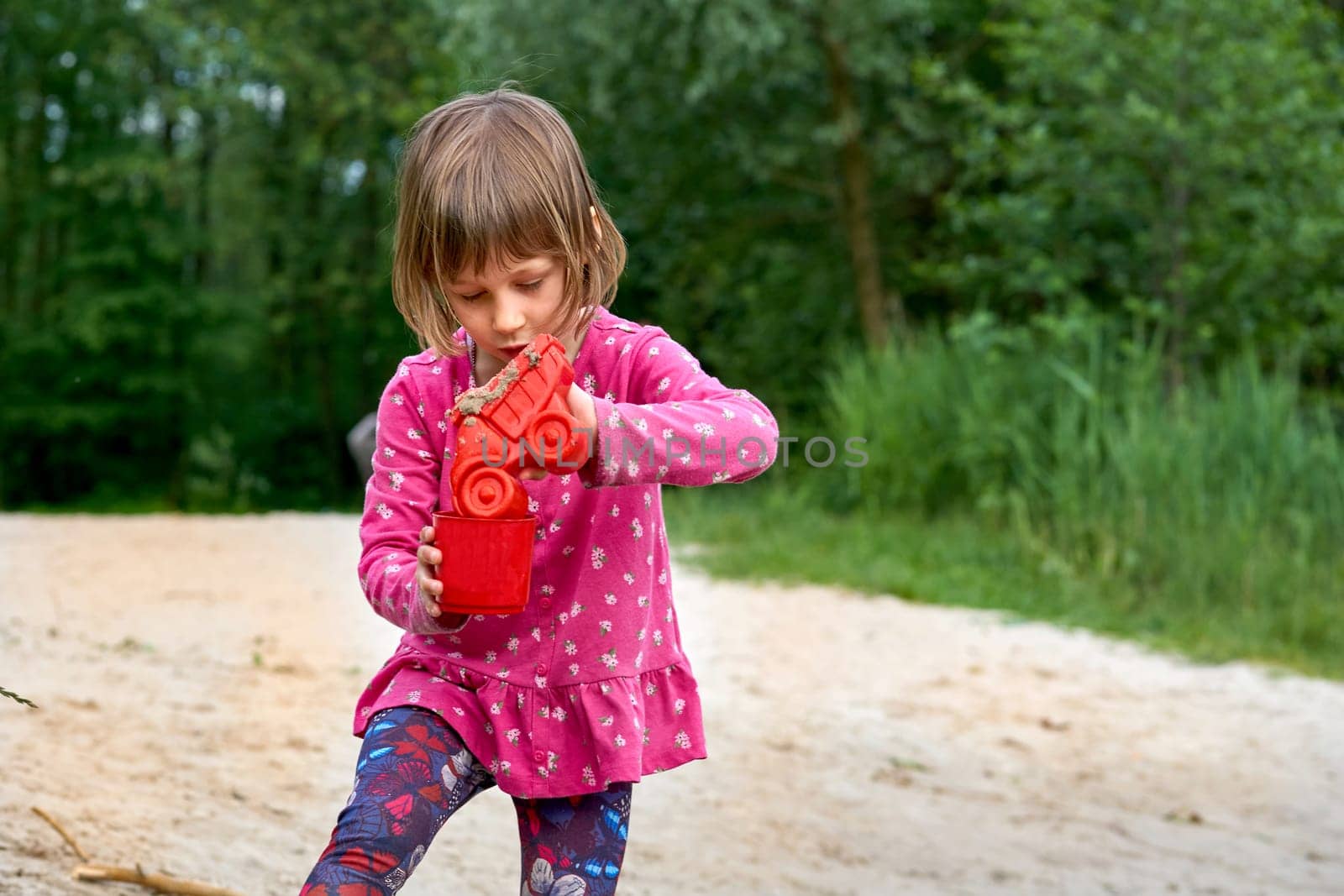 an object for a child to play with, typically a model or miniature replica of something