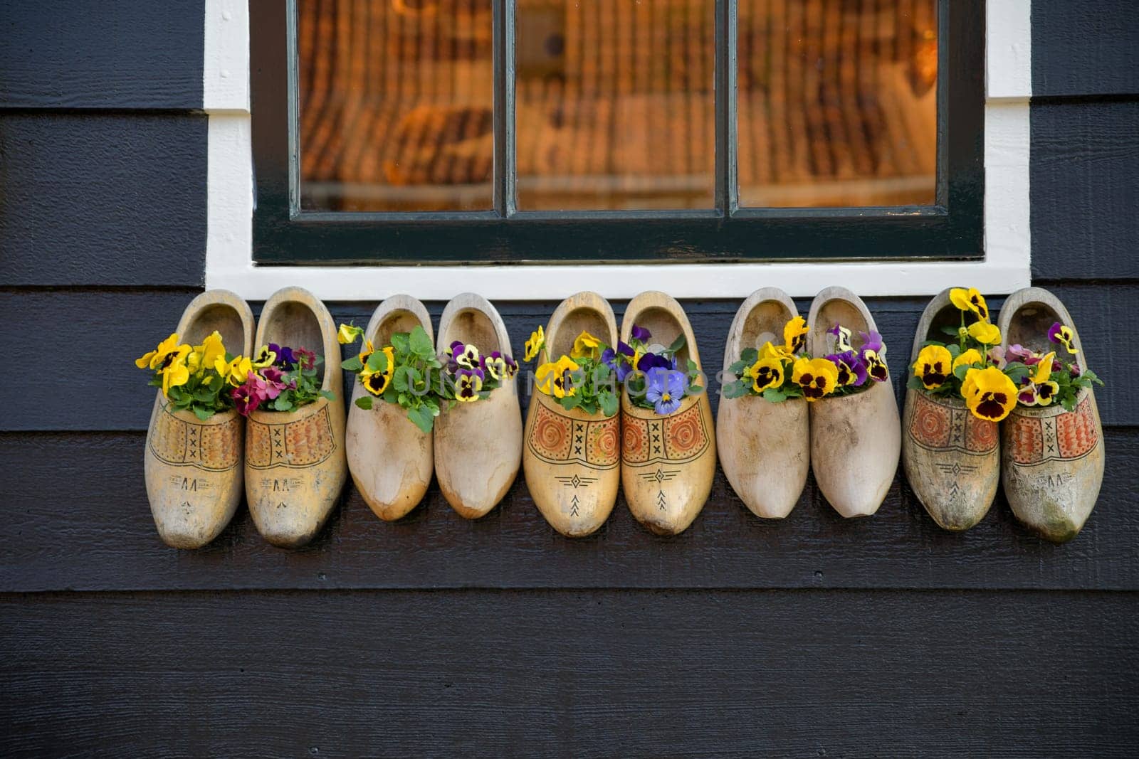 Dutch wooden clogs with flowers inside