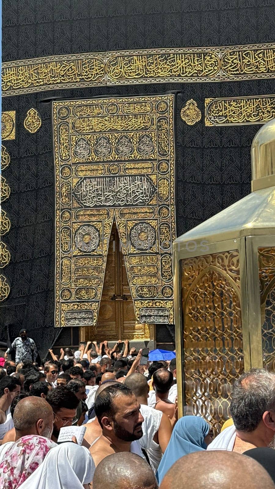 MECCA, SAUDI ARABIA - MAY 02 2024: View on Kaaba from second floor of Masjid Al Haram through some new constructions building around the masjid. High quality photo
