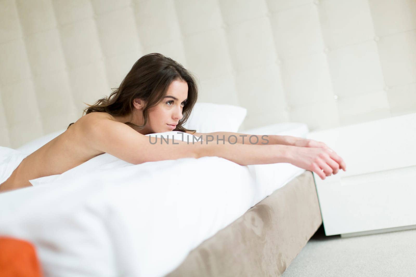 Attractive woman in the bed