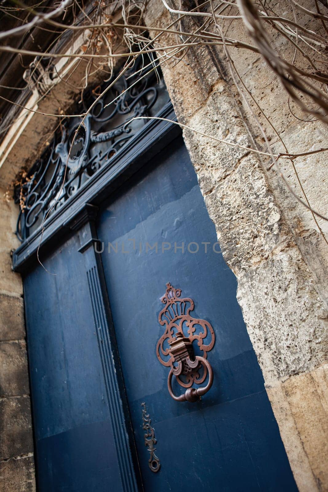 Facade of an old French mansion in Bordeaux city
