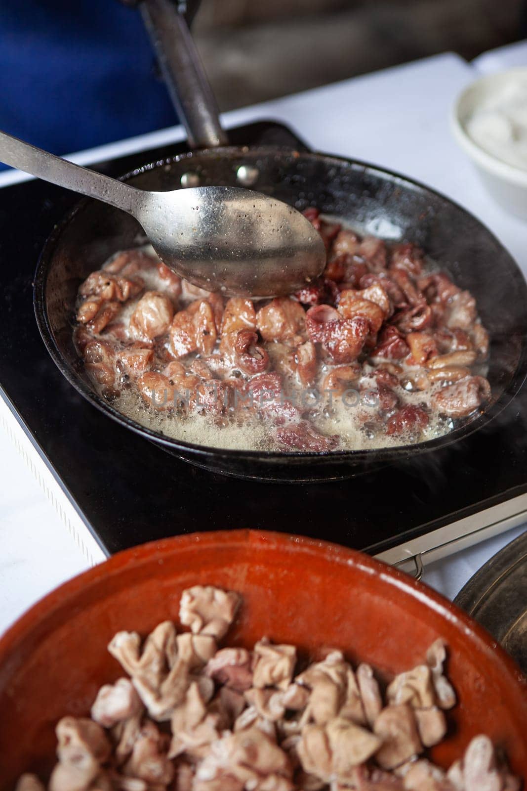 Cooking pork tripe in a frying pan