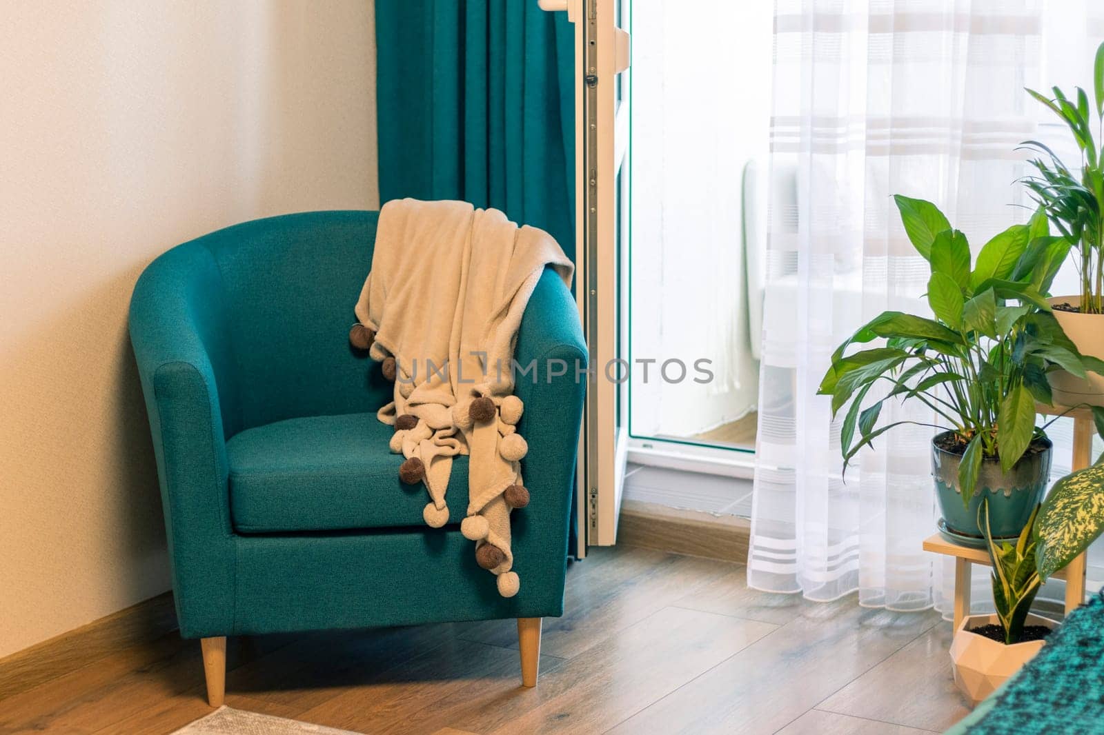 Close up of the cozy corner in the apartment with comfortable arm chair