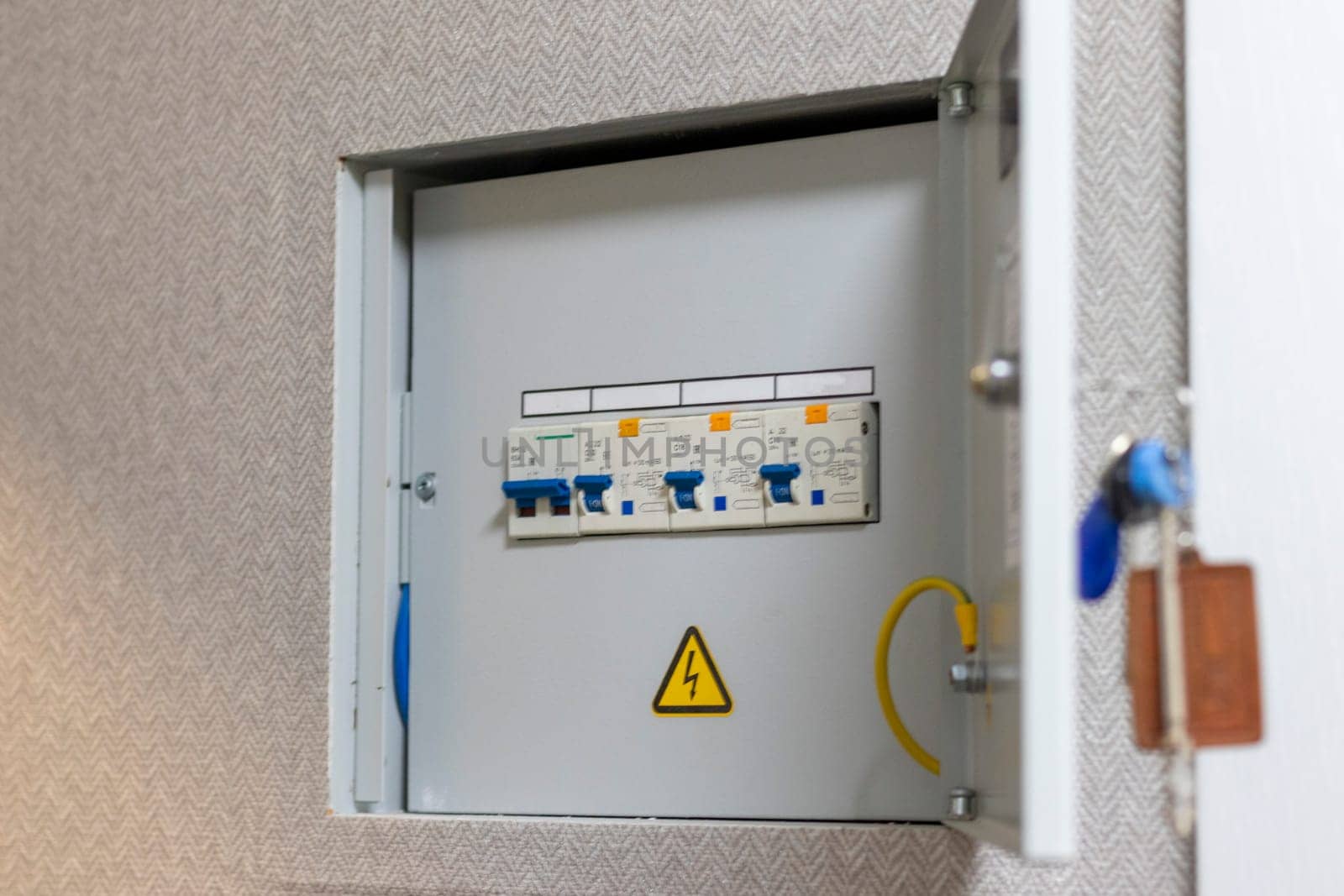 Open electrical switchboard in the apartment