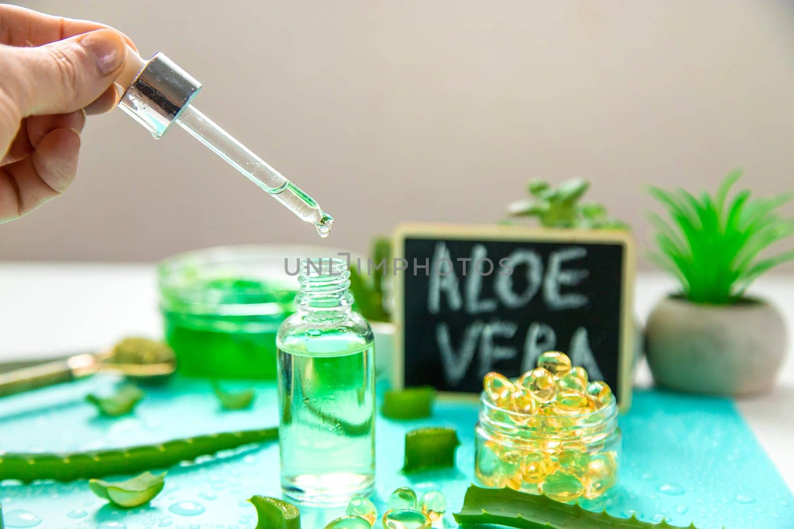 Aloe vera capsules and extract drops. Selective focus. nature.
