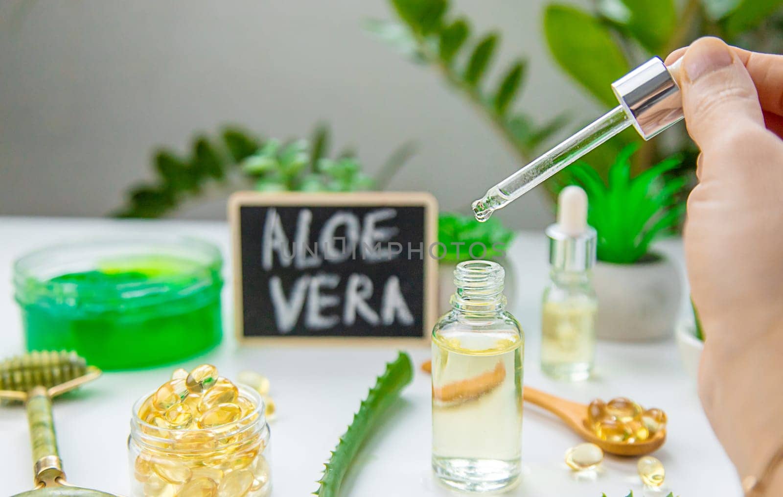 Aloe vera capsules and extract drops. Selective focus. nature.