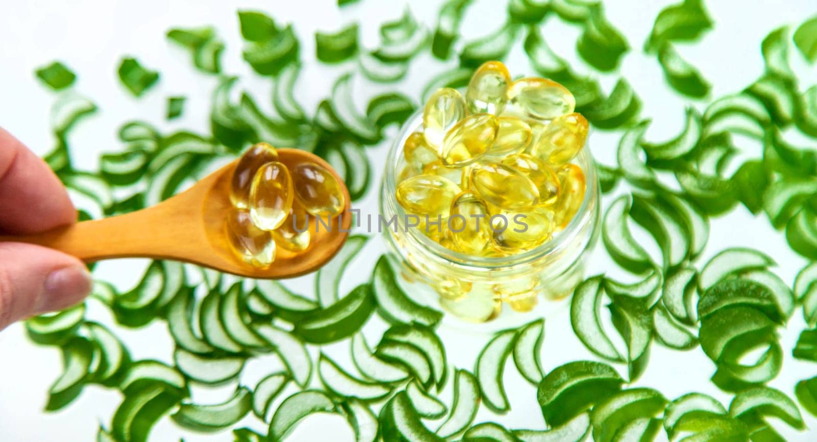 Aloe vera capsules and extract drops. Selective focus. nature.