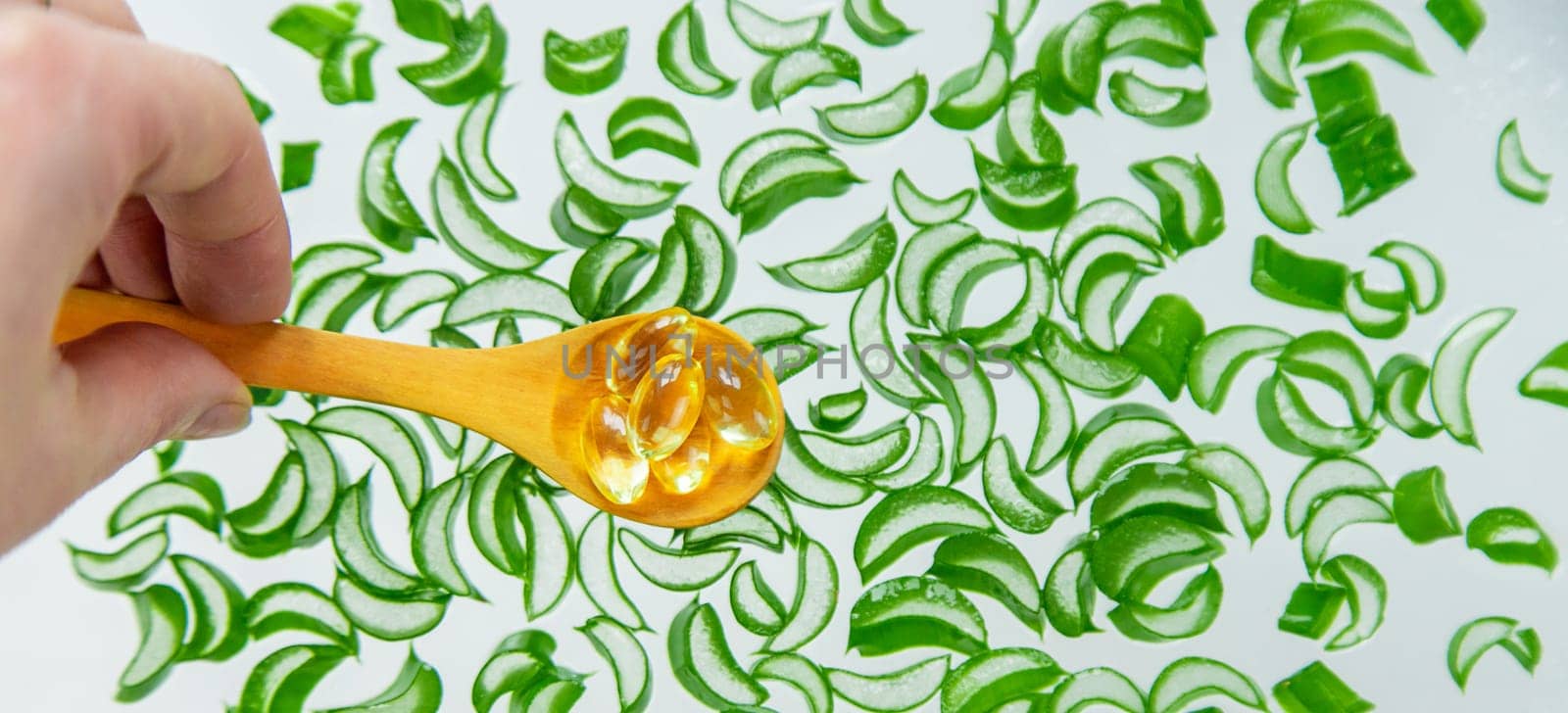 Aloe vera capsules and extract drops. Selective focus. nature.