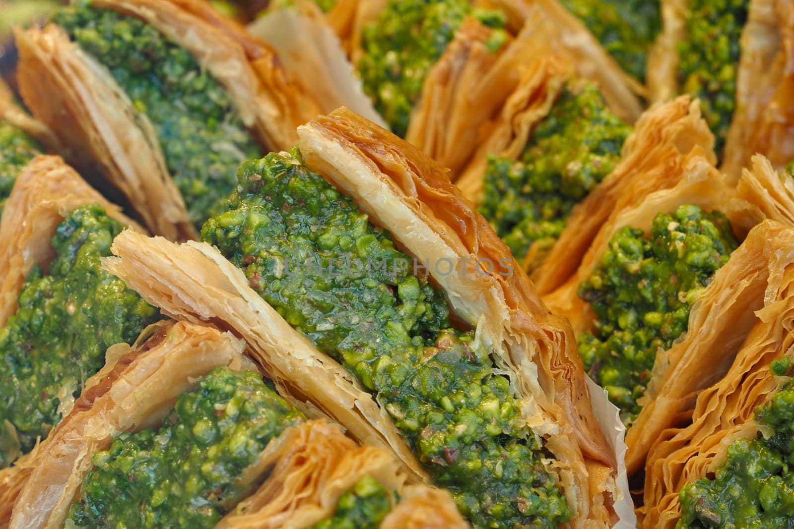 Freshly baked turkish balava with pistachios on top