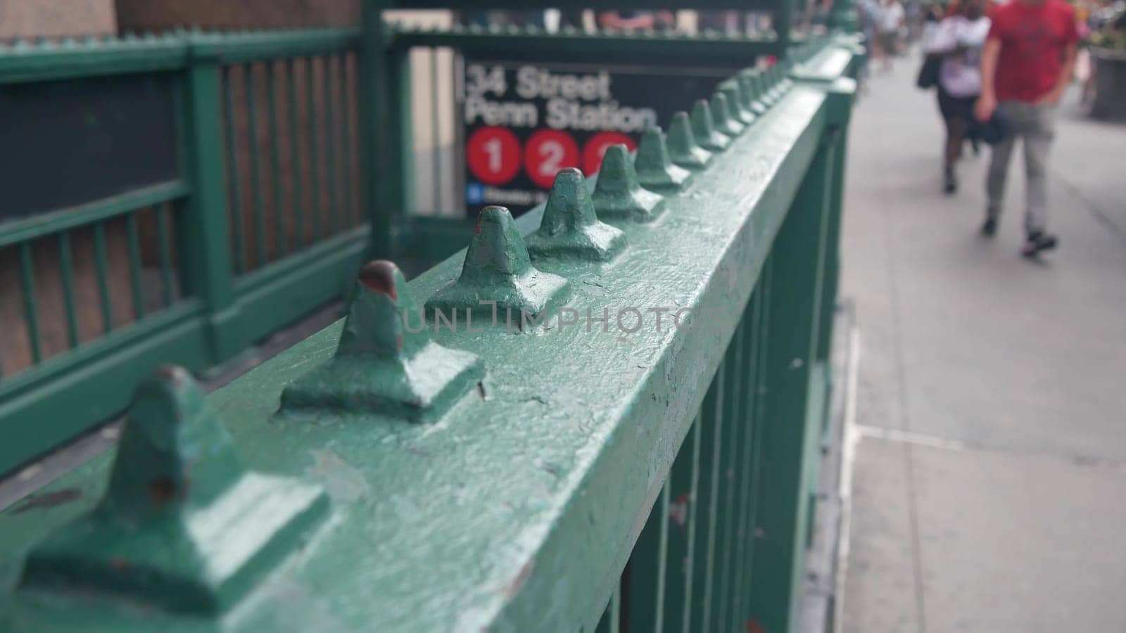 New York City, United States - 29 Aug 2023: Subway sign, underground metro station. Metropolitan entrance, Manhattan public transport. Pedestrians people. 34 street, Penn Station, passenger railroad.