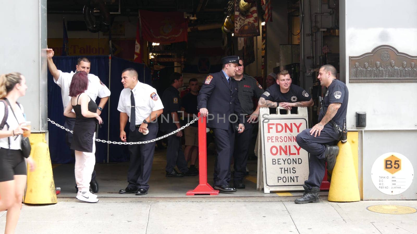 New York City, United States - 11 September 2023: Firefighters celebrate Patriot Day. 911 memorial remembrance event, FDNY commemorate anniversary. Fire Department Station, Manhattan 10 Ten Firehouse.