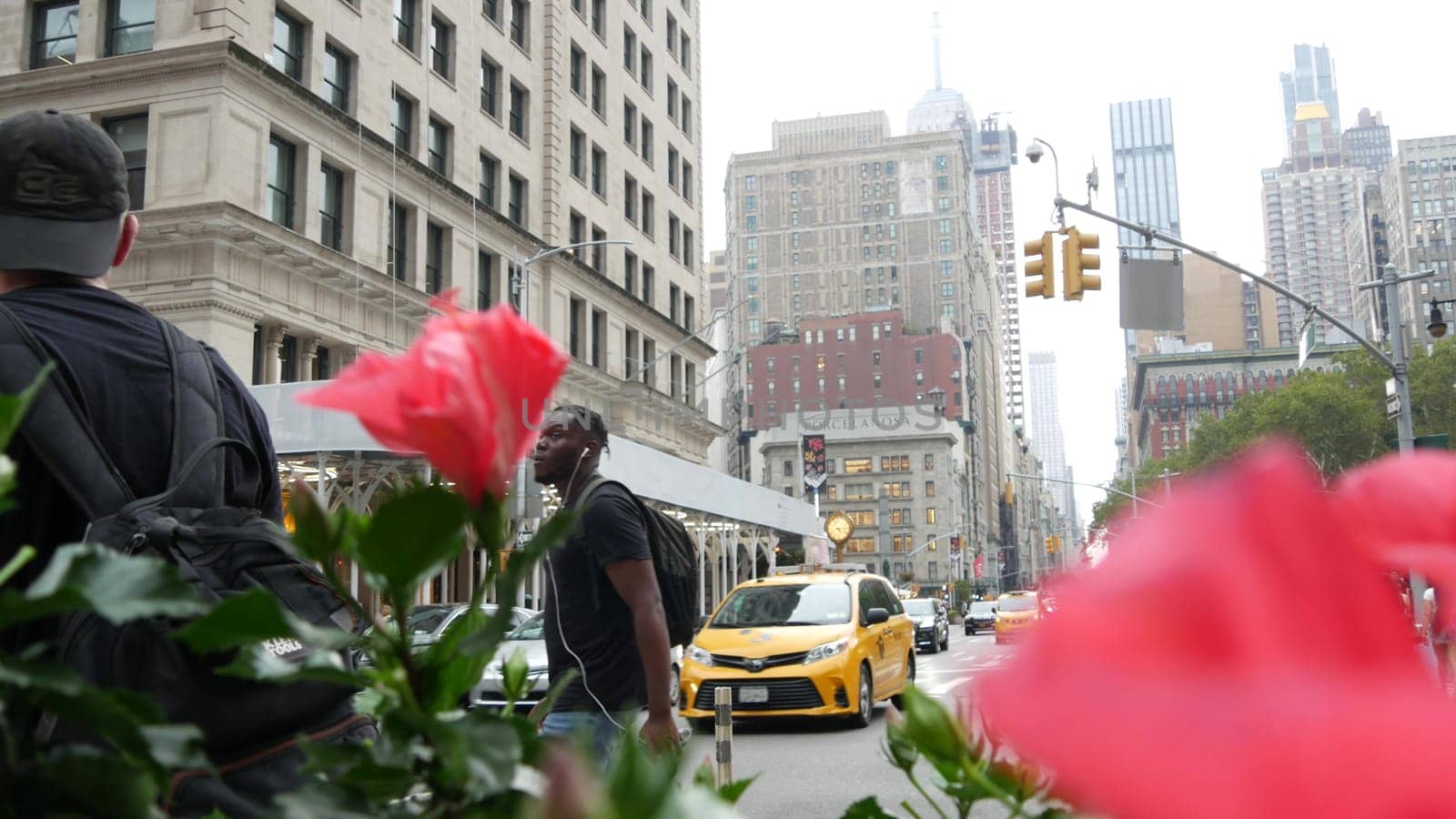 New York City, United States - 8 Sept 2023: Manhattan Midtown Broadway, 23 street, 5 avenue crossroad intersection. Worth Square near Madison Park and Flatiron Building, USA. People. Yellow taxi car