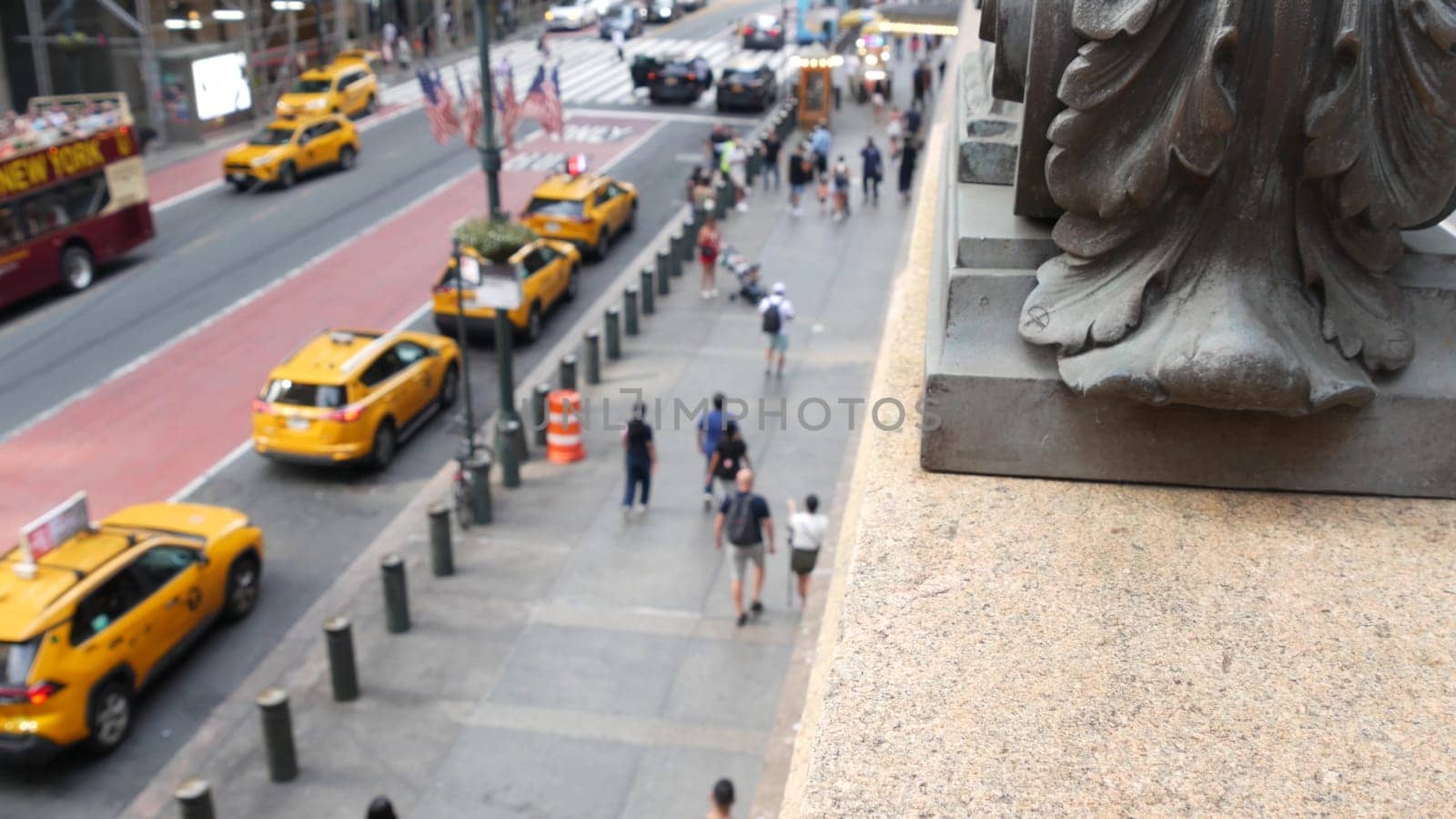 New York City, United States - 4 Sept 2023: Grand Central Terminal railway station, 42 street. Manhattan Midtown. Yellow taxi cab, cars on Pershing Square, USA. American urban road traffic and people.