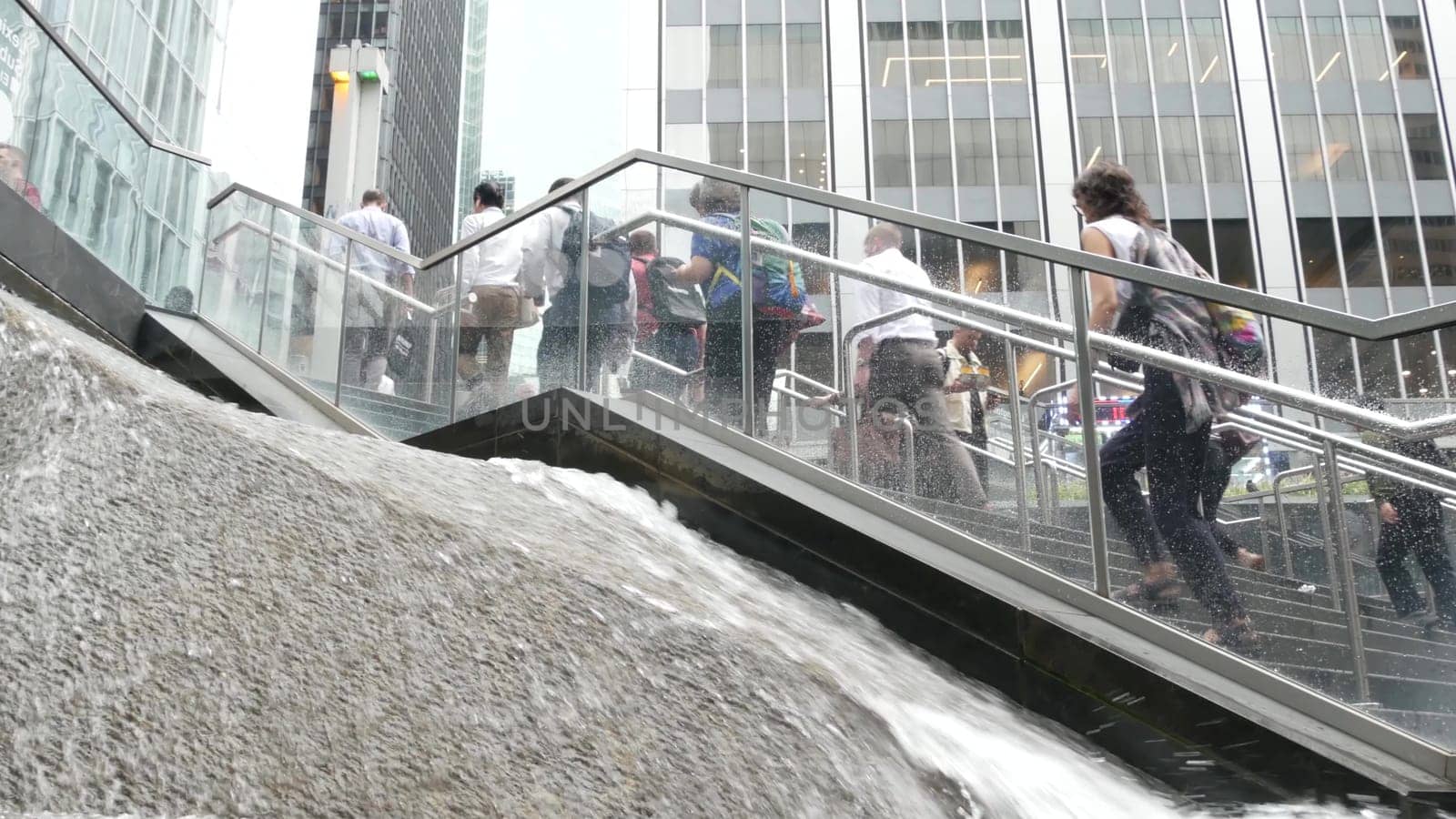 New York City, United States - 11 Sept 2023: Manhattan Midtown office buildings, Lexington avenue, United States. People pedestrian exiting subway metro station, stairs on 53 street, USA urban life.