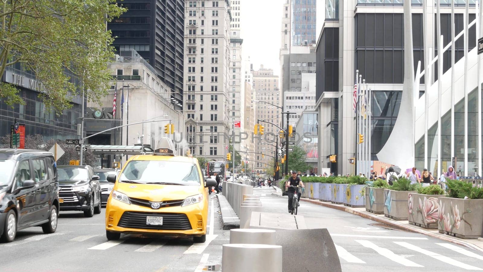 New York City, United States - 10 Sept 2023: Manhattan Downtown Financial District Church street, crossroad intersection zebra. Road car traffic, Yellow taxi. People pedestrian near World Trade Center