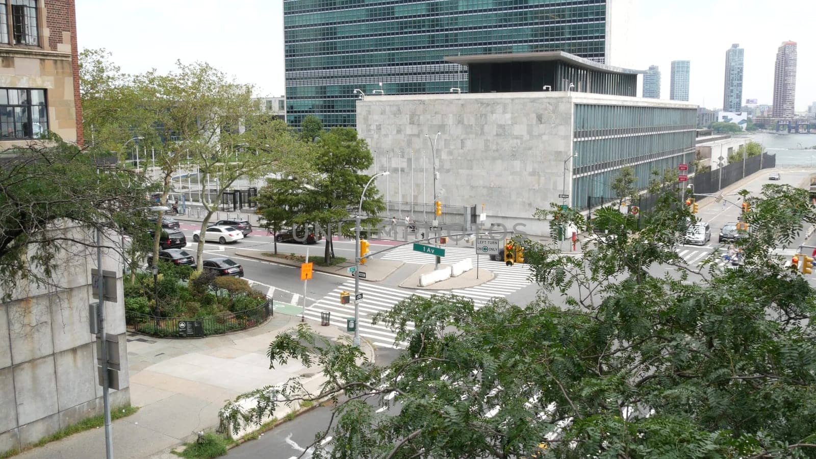 New York City, United States - 4 Sept 2023: United Nations UN Headquarters, Manhattan Midtown, USA. Diplomatic political international organization before General Assembly conference. Street traffic.