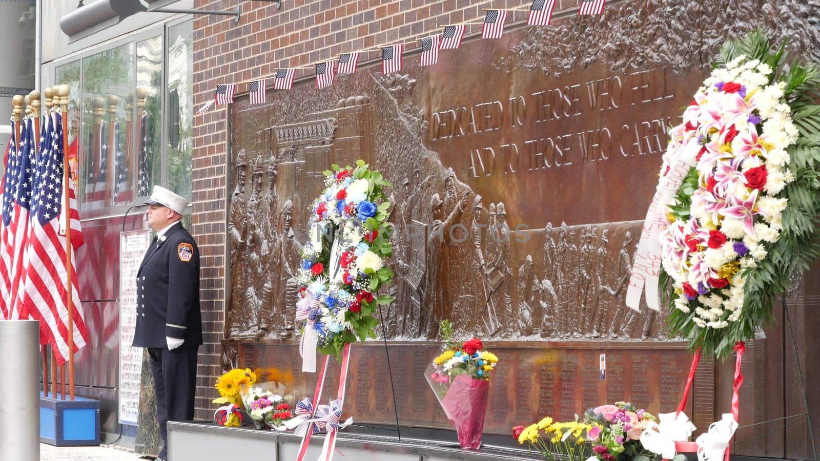 New York City, United States - 11 September 2023: Firefighters celebrate Patriot Day. Guard honoring 911, Memorial wall, FDNY commemorate anniversary. Fire Depart Station, Manhattan 10 Ten Firehouse.