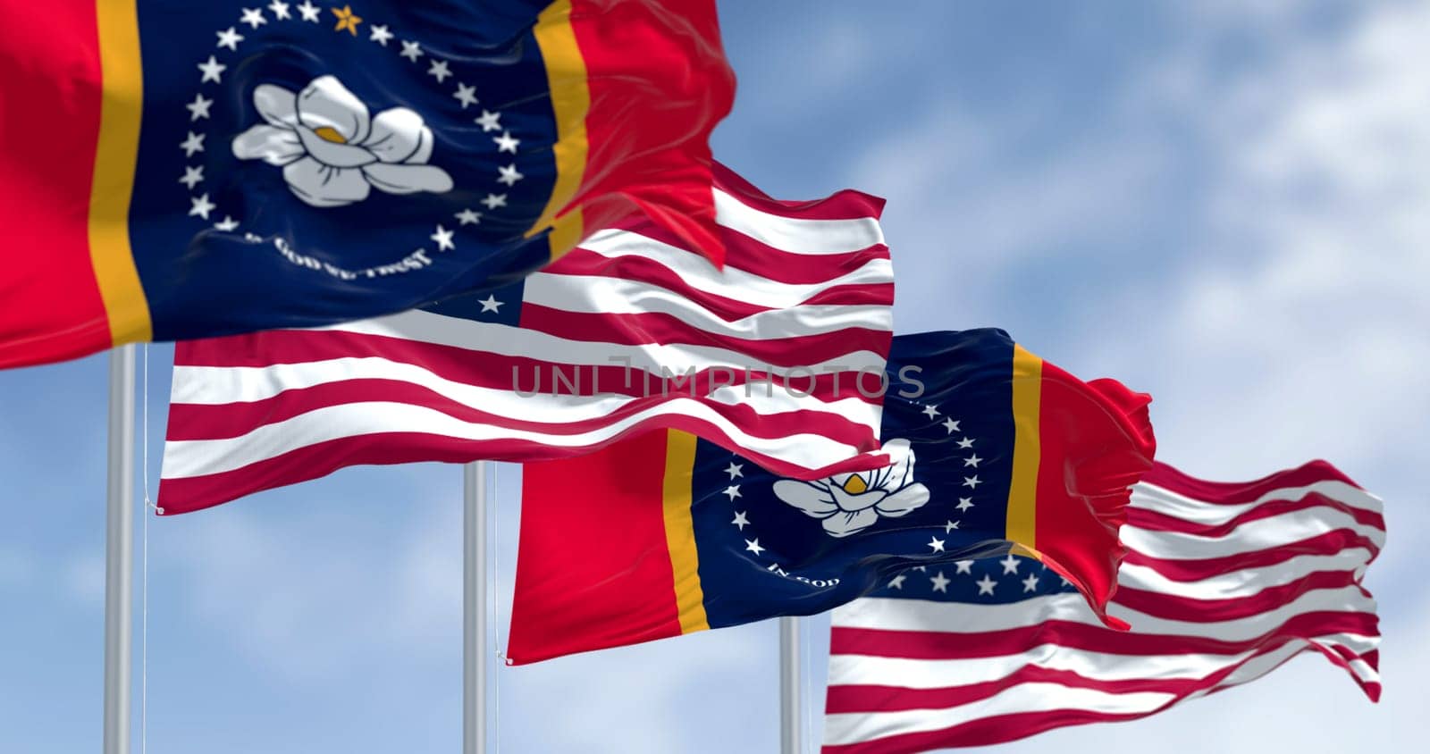 Photorealistic 3D render of Mississippi and United States flags flying on flagpoles, symbolizing unity, freedom, and patriotism on a sunny day.