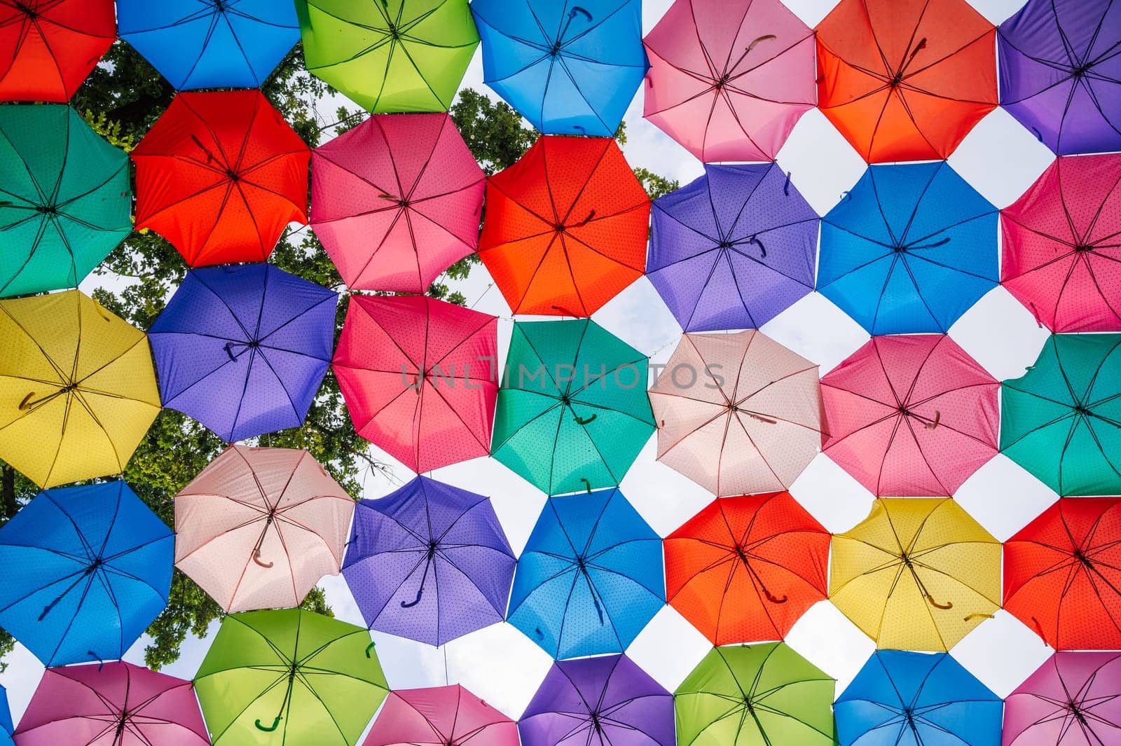 multicolored bright colorful umbrellas decoration on festive street in Tashkent in Uzbekistan