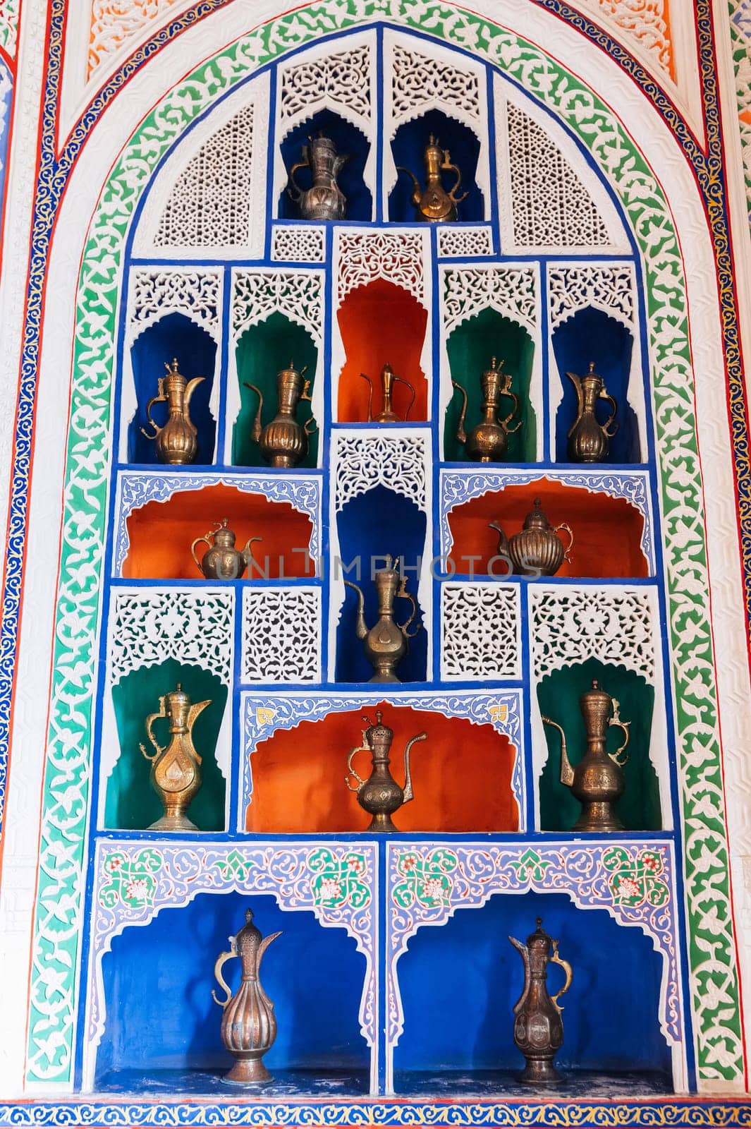 ancient Uzbek copper and brass jugs on exhibition in Museum in Tashkent in Uzbekistan