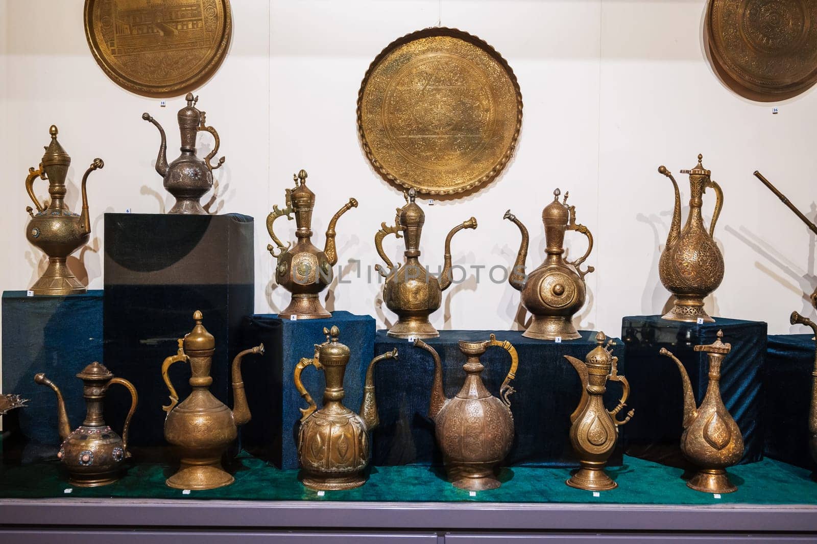antique traditional Uzbek copper and brass jugs at the Museum of Antiques in Tashkent in Uzbekistan