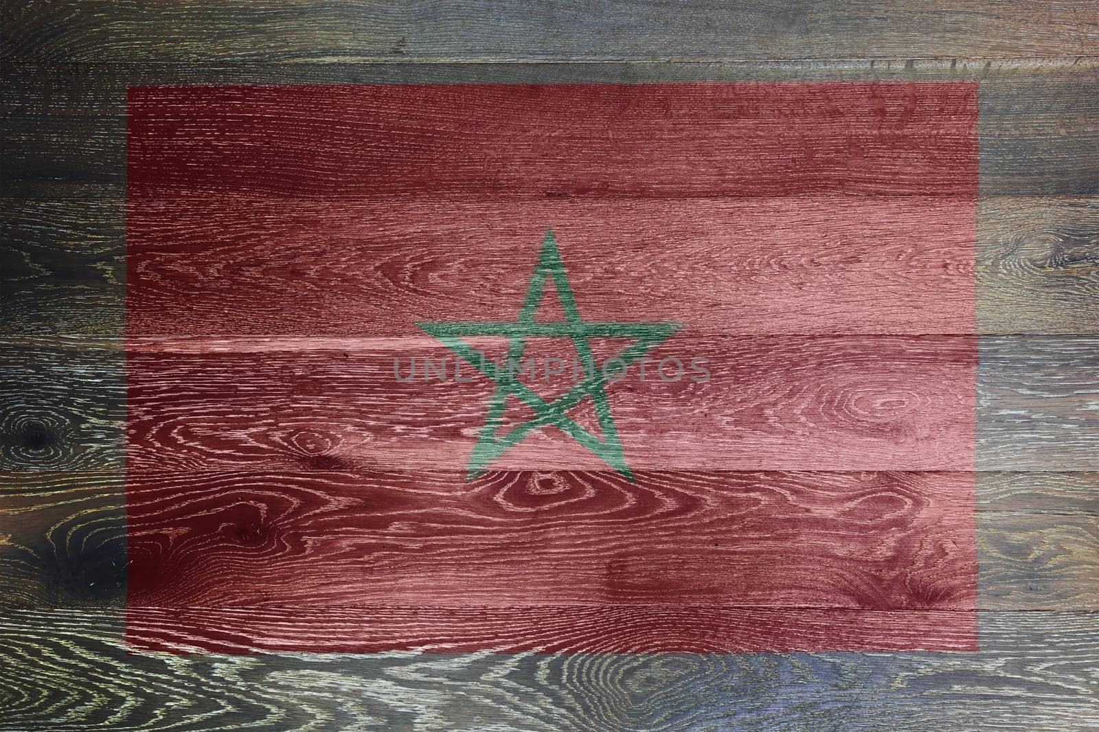 A Morocco flag on rustic old wood surface background