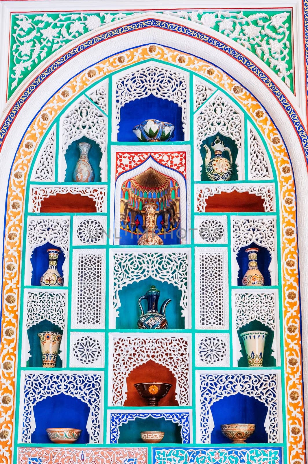 Antique traditional Uzbek ceramic jugs, vases and tableware on exhibition at the Museum of Antiques in Tashkent, Uzbekistan