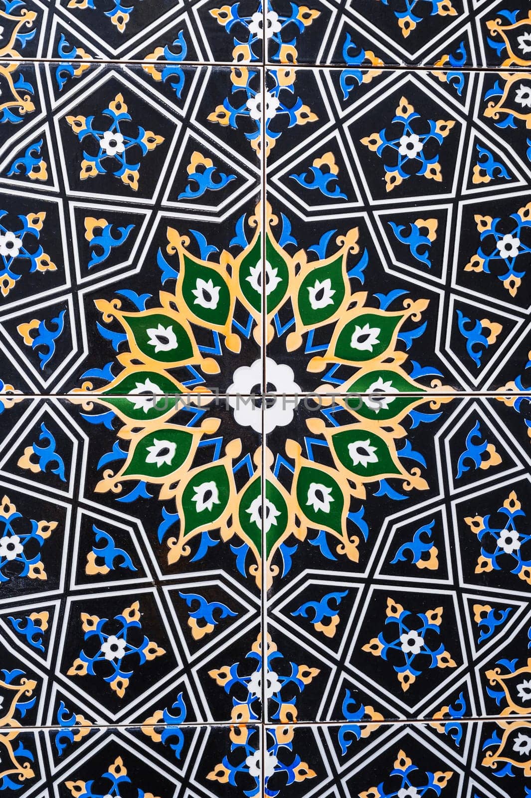 ceramic tiles with a traditional Uzbek oriental pattern in Uzbekistan. Decorative floral background with Islamic ornament