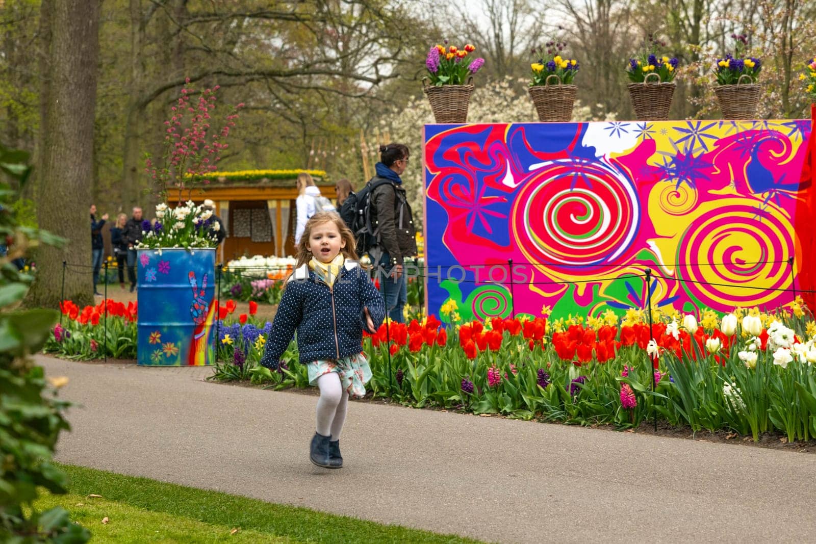 Lisse, Netherlands - April 17, 2019: People,kids and decoration in a Keukenhof park