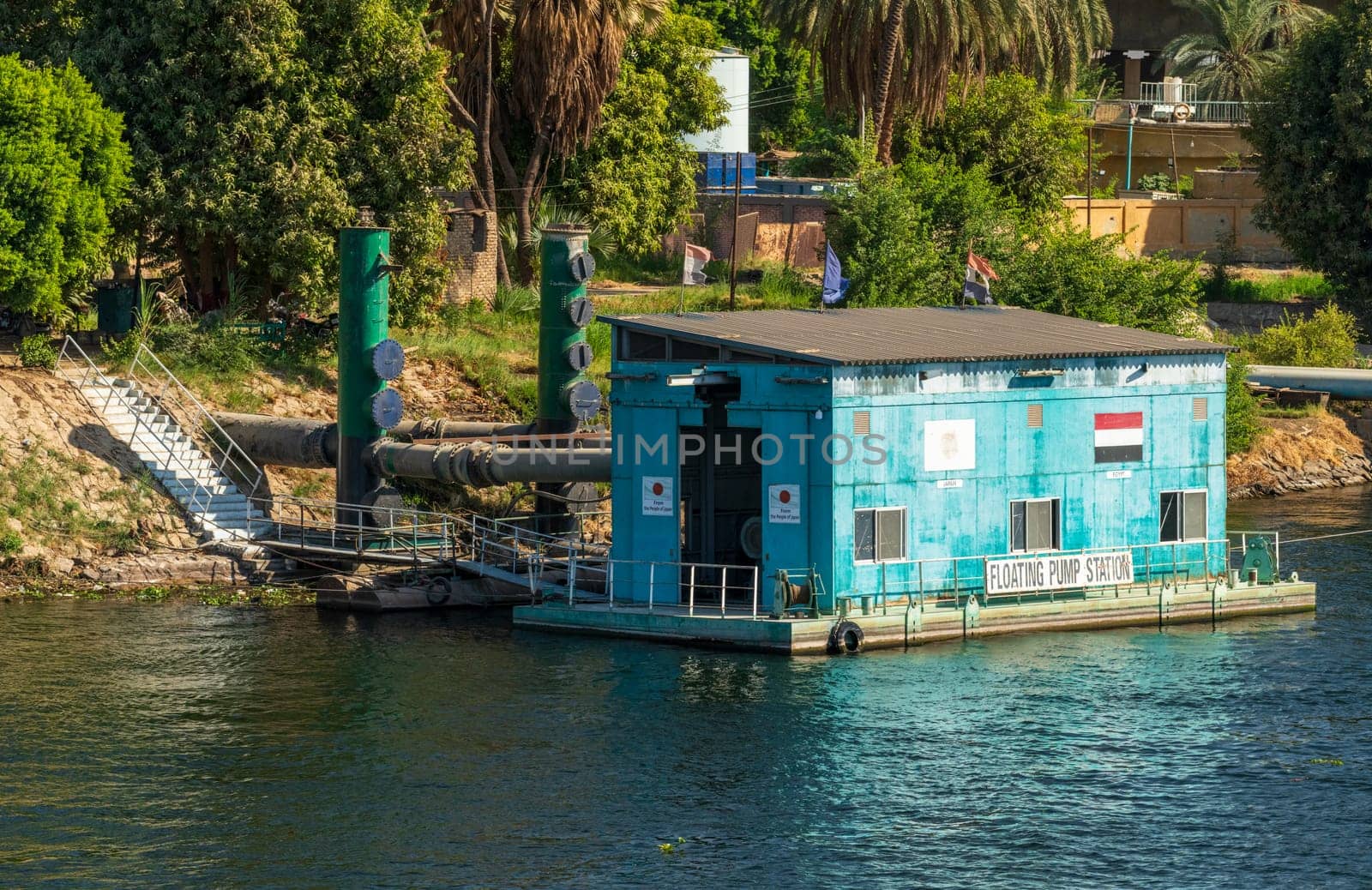 Floating pump station provided by people of Japan alongside Nile River near Edfu in Egypt
