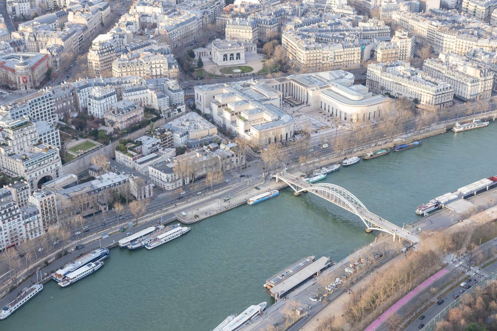 Paris city panorama with Pont Debilly Footbridge, the aerial view from the Eiffel tower in early spring.