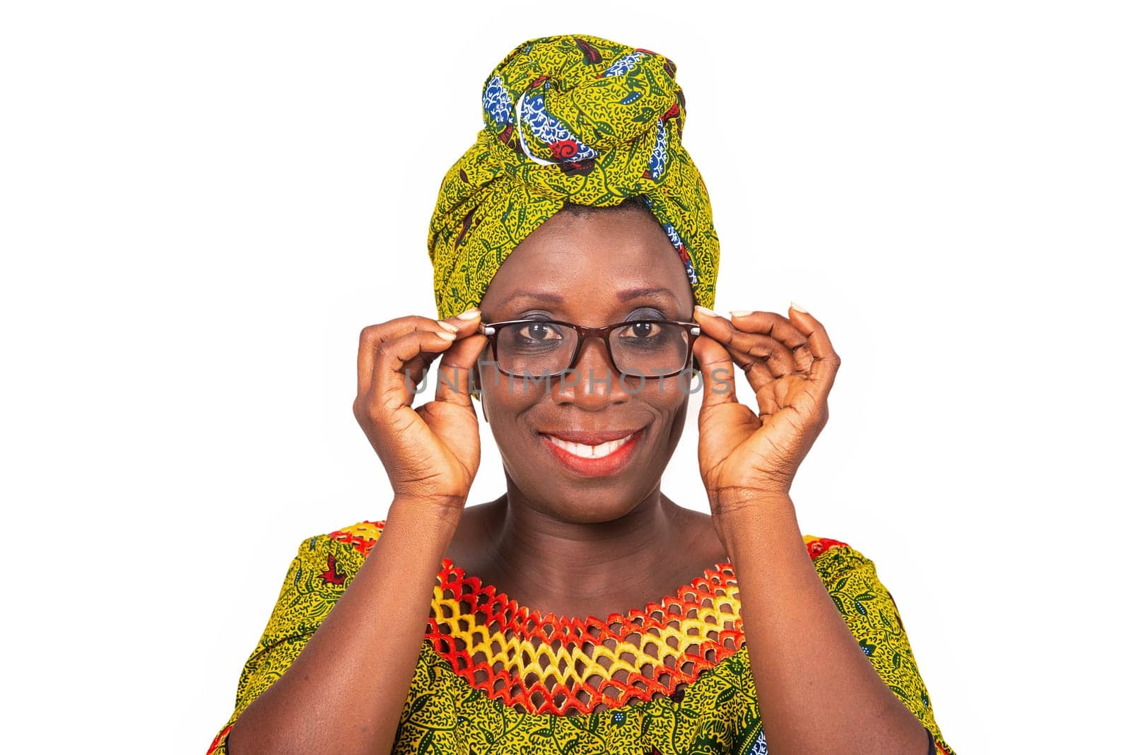 beautiful african adult woman dressed in green loincloth is wearing beautiful glasses with eyes smiling