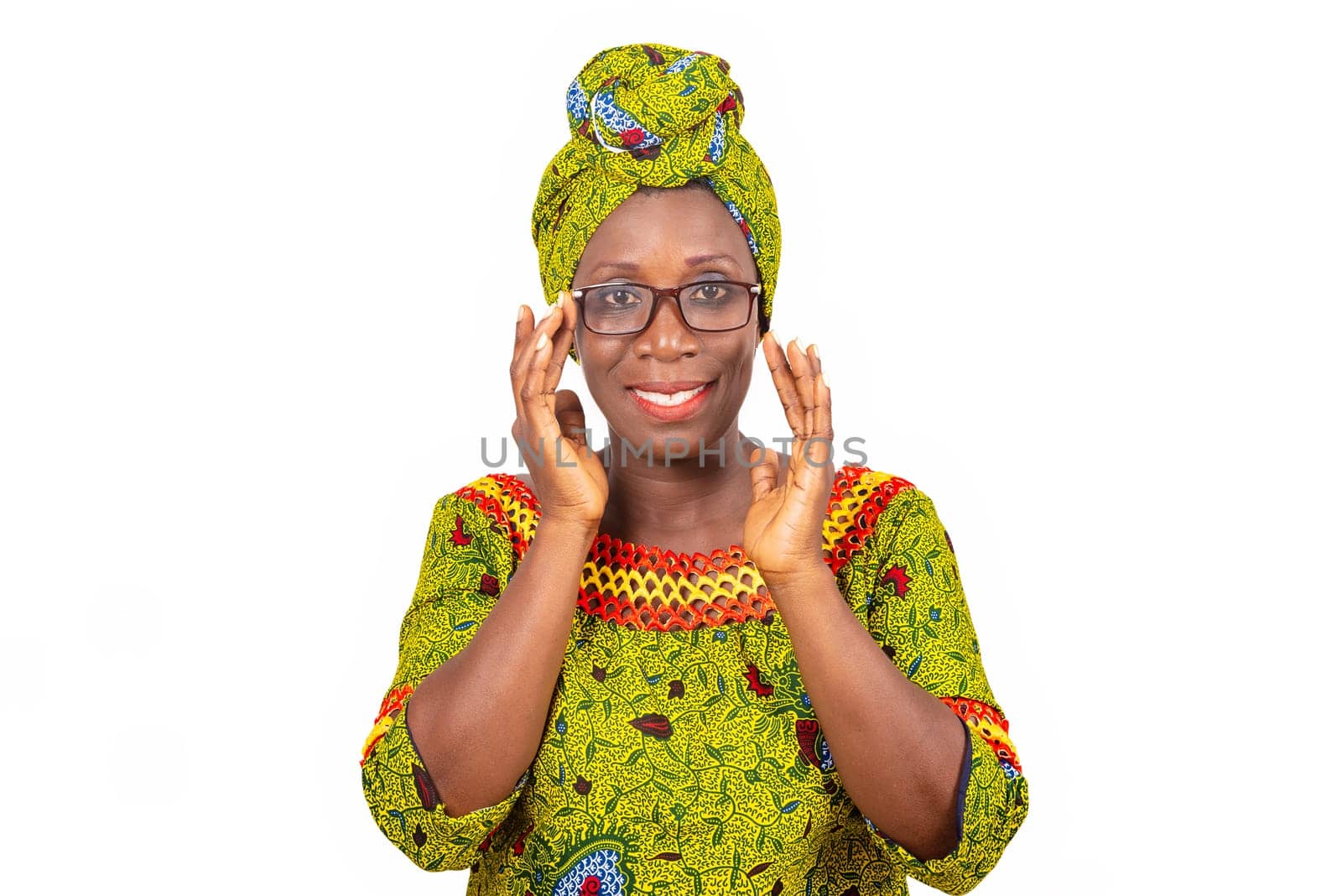 beautiful african adult woman dressed in green loincloth wearing beautiful glasses with eyes smiling