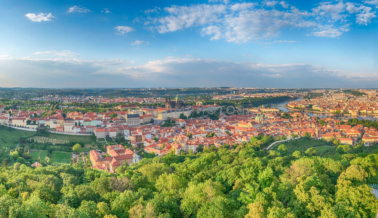 Panoramic view of the city center of Prague, Czech Republic, with the Vltava River flowing through it, as seen from Petrin hill