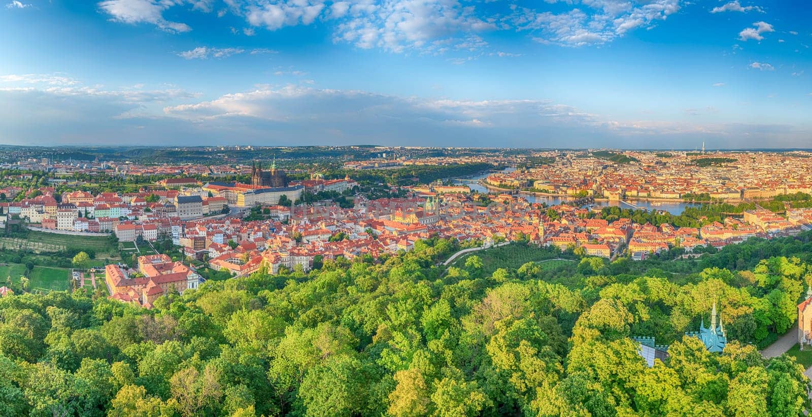 Panoramic view of the city center of Prague, Czech Republic, with the Vltava River flowing through it, as seen from Petrin hill