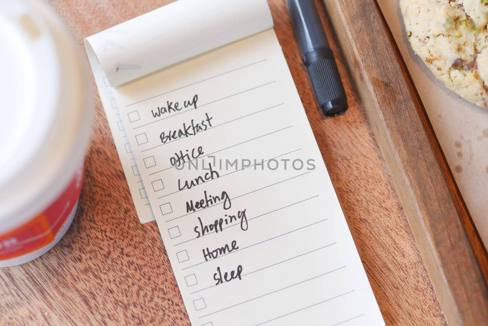 Notepad features daily tasks alongside breakfast coffee and pastry.