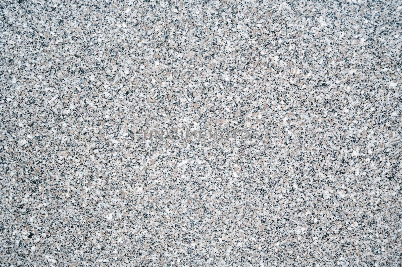background with a white granite stone texture with speckles for paving slabs