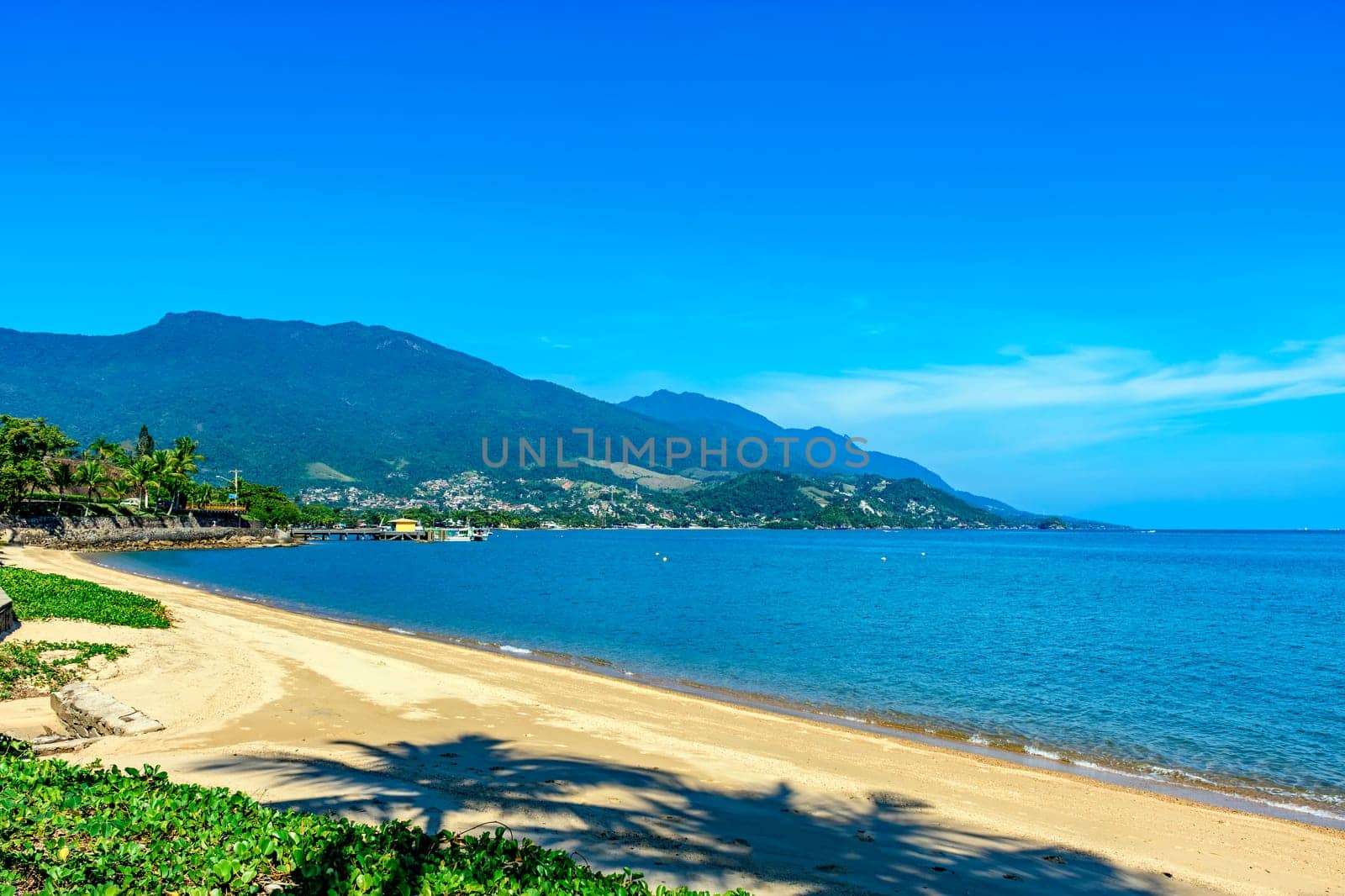 Beach and waterfront of Ilhabela city on a sunny summer day