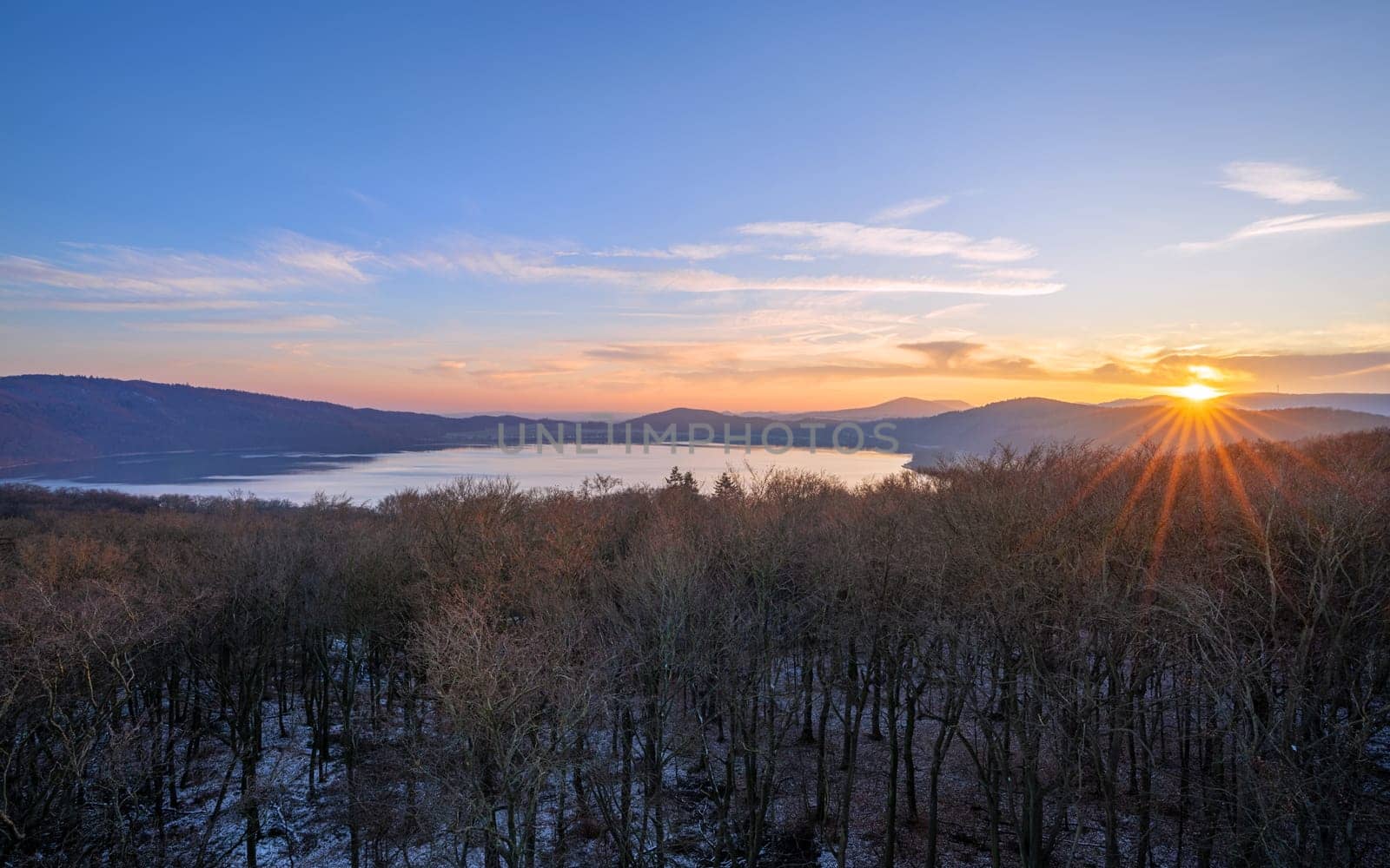 Panoramic image of Laacher lake during morning hours, Eifel, Rhineland-Palatinate, Germany