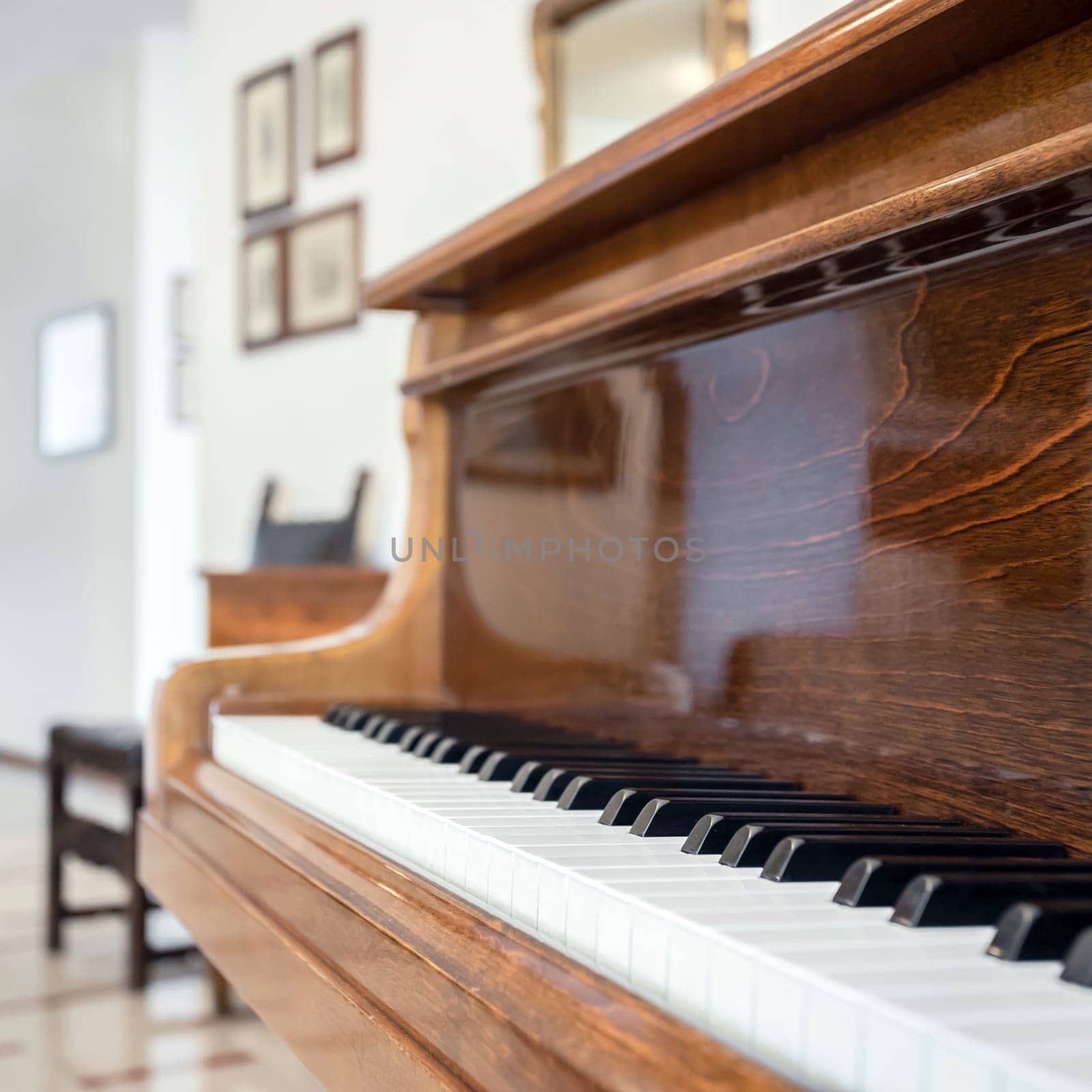 Vintage grand piano with defocused background