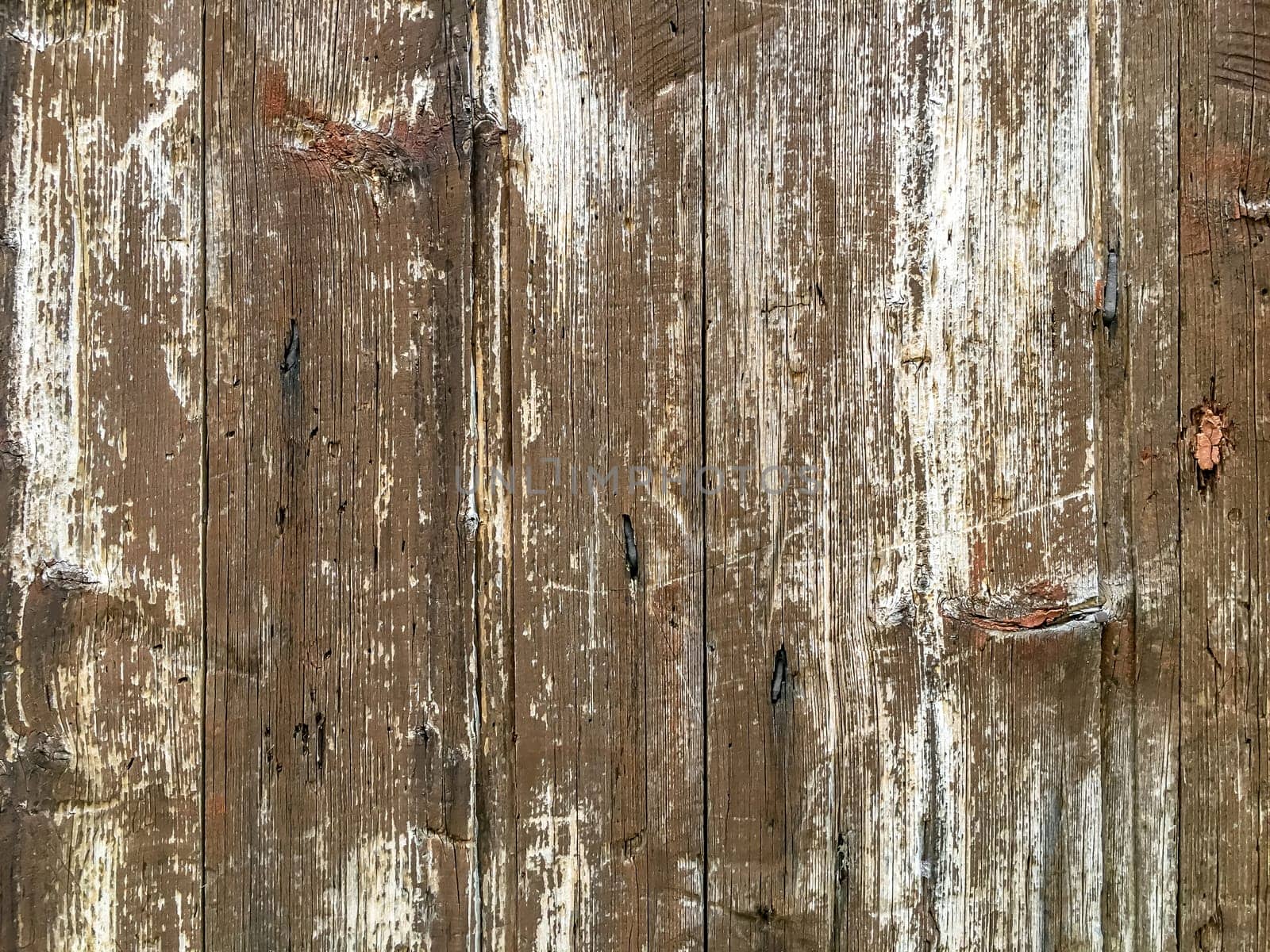 Brown wood texture background coming from natural tree. The wooden panel has a beautiful dark pattern, hardwood floor texture.