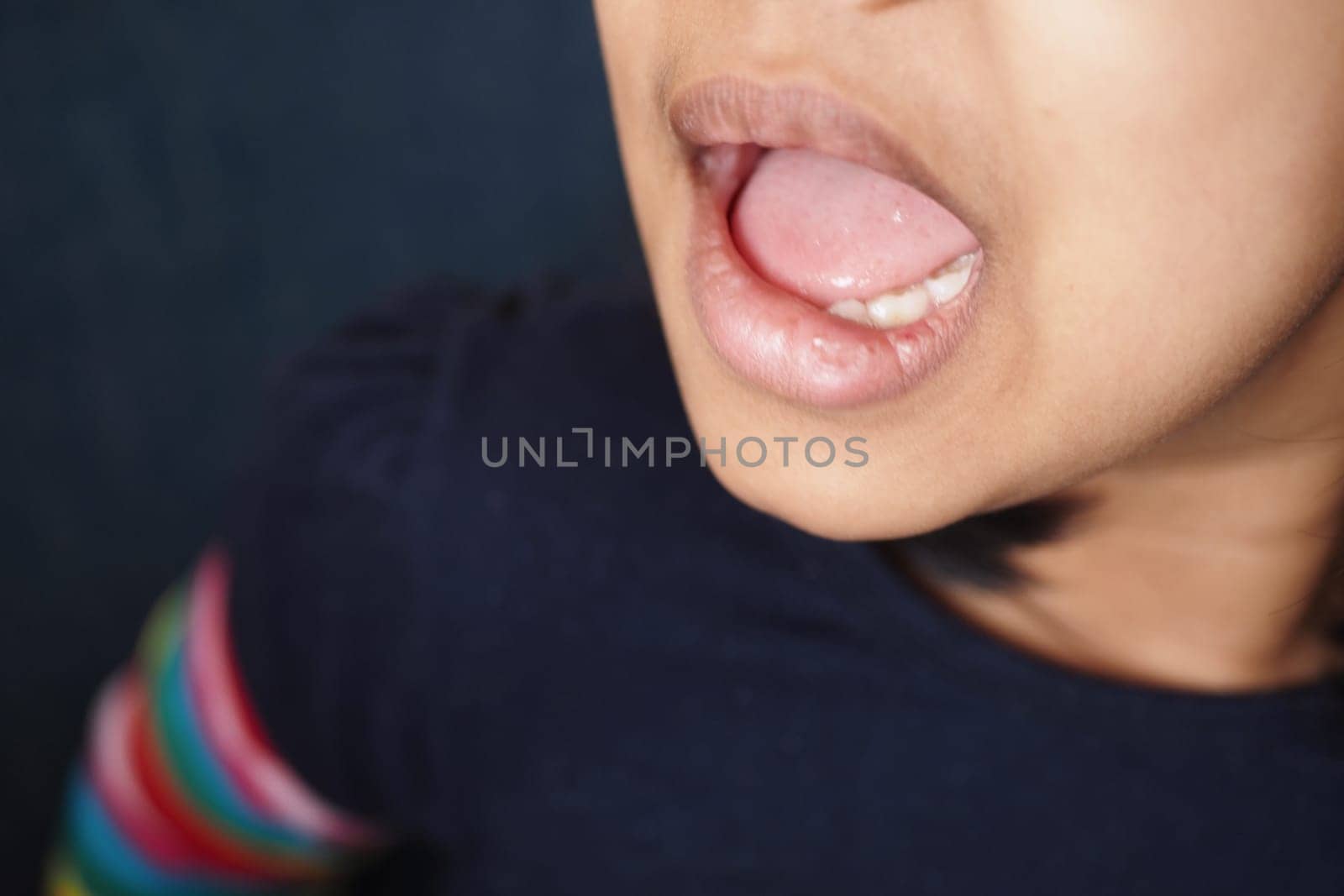 Closeup of Child mouth shouting .