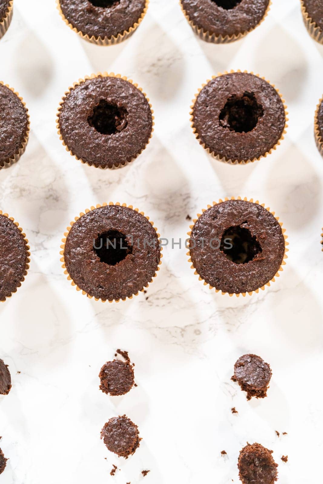 Each chocolate cupcake receives a generous filling of luscious caramel, adding an extra layer of flavor and indulgence.
