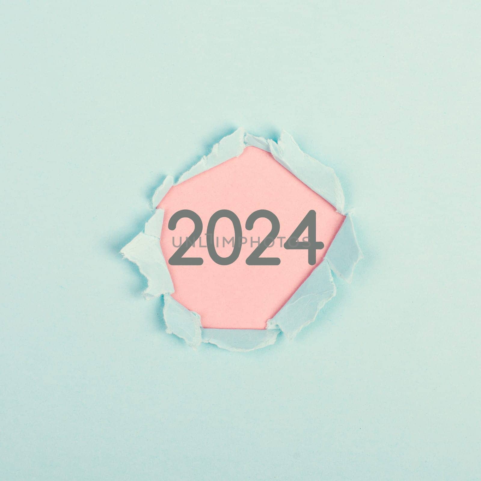 New year 2024 stands behind ripped paper, calendar date, end of the year, changing time, New Year's Eve holiday
